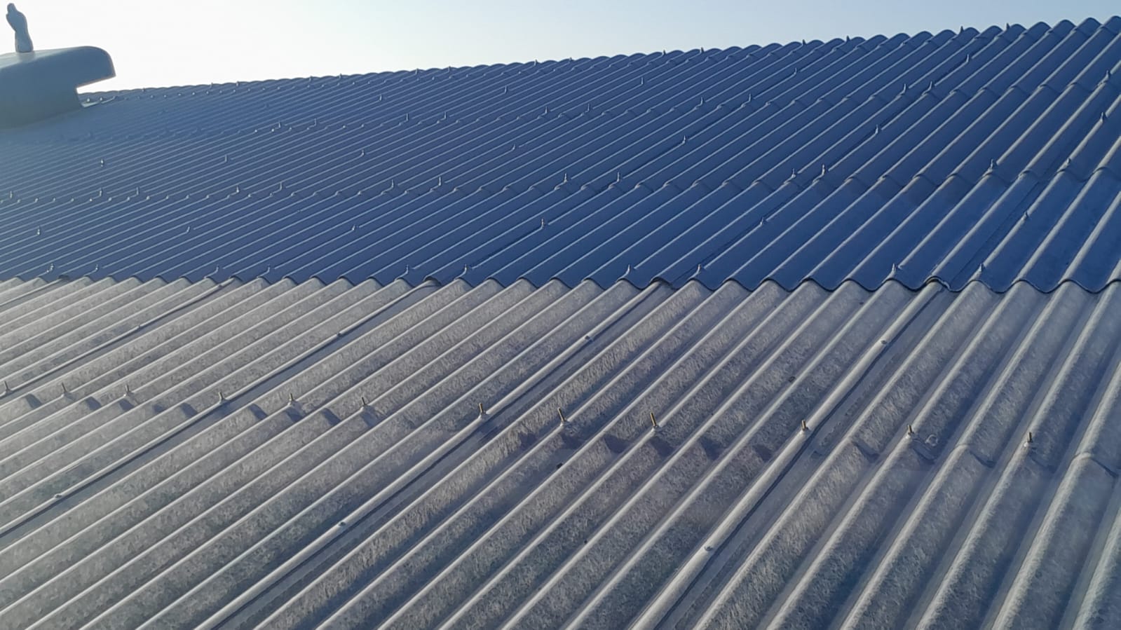 Completed asbestos roof fully sealed with Gaco liquid-applied coating