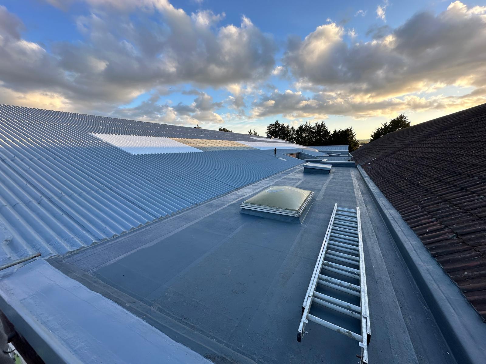 Completed silicone-coated asbestos roof with rooflight