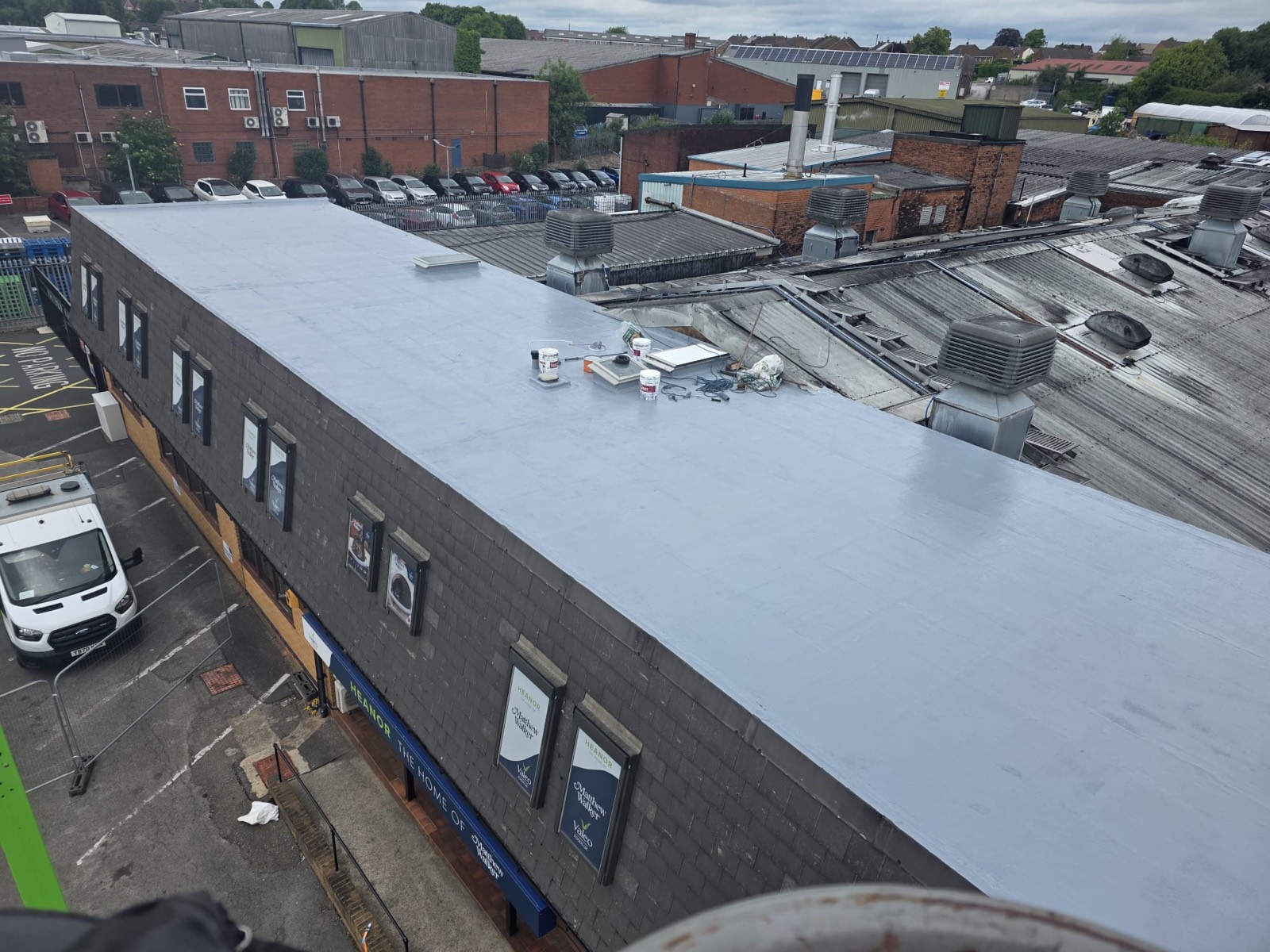 Aerial view of the Heanor commercial flat roof fully recoated in grey GacoFlex silicone